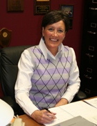 Rita Schroeder at her desk
