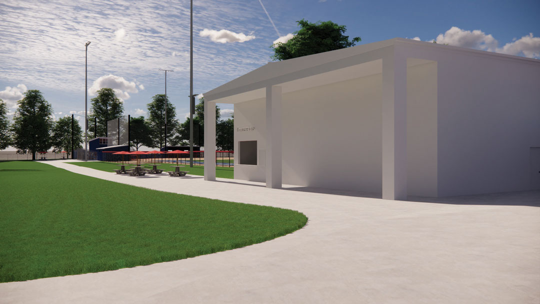 Indoor practice building with the softball field in the background