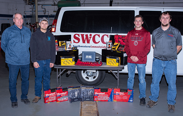 Jeff Sorensen, SWCC automotive repair technology instructor; Wyatt Vasey of Winterset; Marshall Eddleman of Winterset; and Kole Vogel, SWCC automotive repair technology instructor.