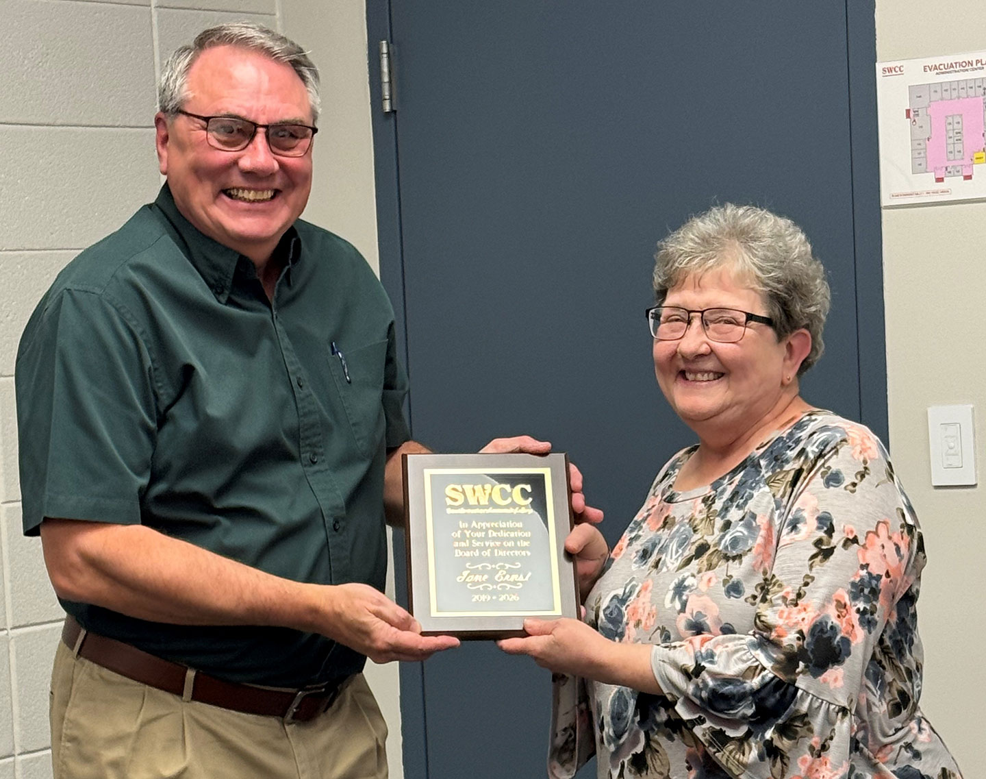 Dr. Tony Cass of Creston, SWCC board president, and Jane Ernst of Greenfield, retiring SWCC board member.