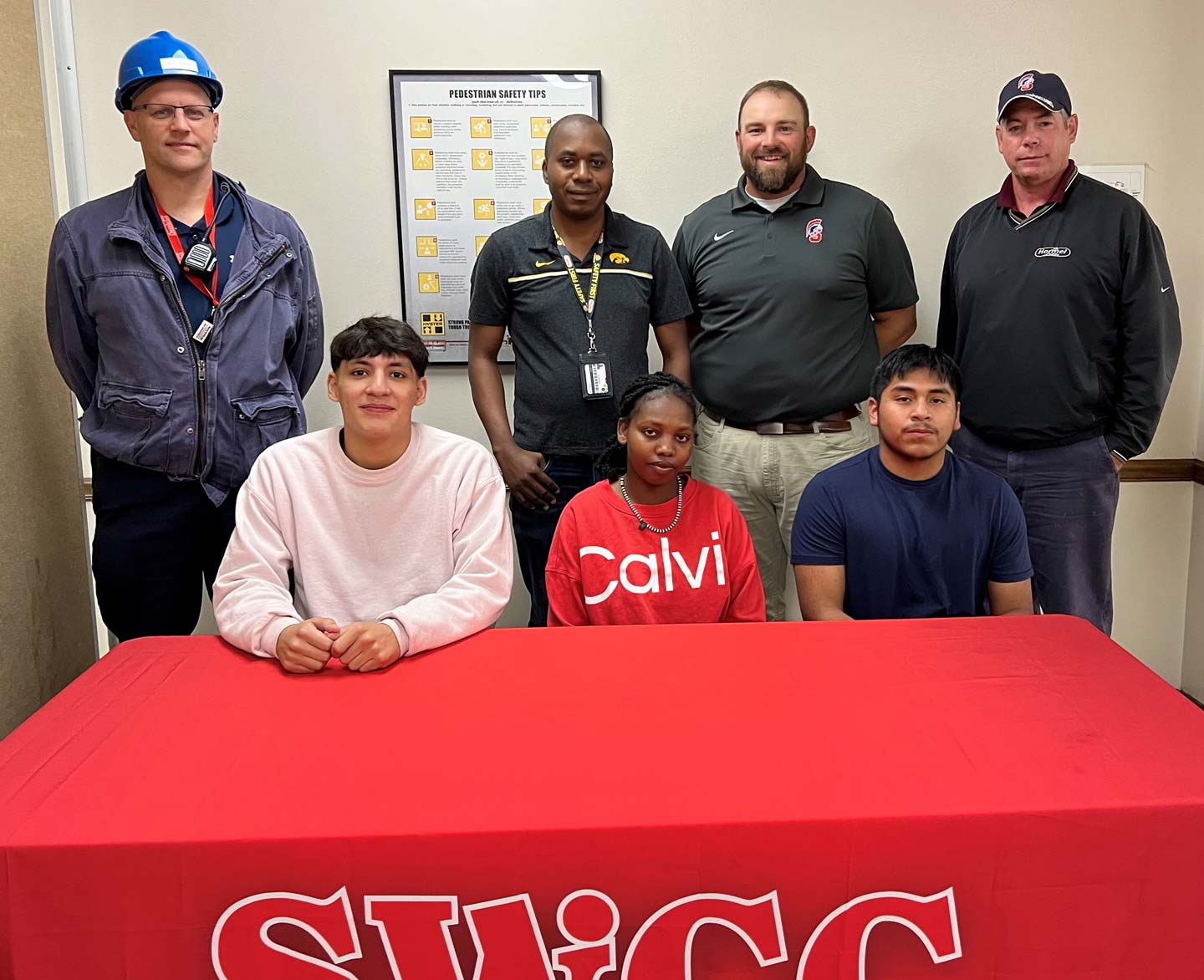 Sitting (L to R) –Christian Nevarez, Tereza Abdu, and Selvin Garcia-Raymundo, applied engineering technology signees. Standing- Nate Conner, Osceola Food superintendent of maintenance and engineering; Marc Ulysse, applied engineering technology student signee; Shawn Oaks, SWCC applied engineering technology instructor; and Chad Soukup, Osceola Food manager of plant engineering.