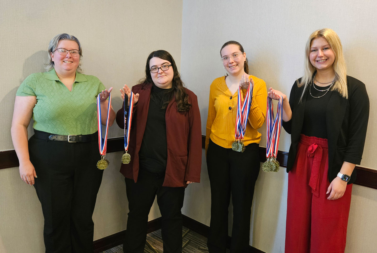 (L to R) – Southwestern Community College business students Lorelei Herrod of Creston; Daisy Waetzig of Lamoni; Victoria Fletchall of Villisca; and Mariah Sparks of Corning. 