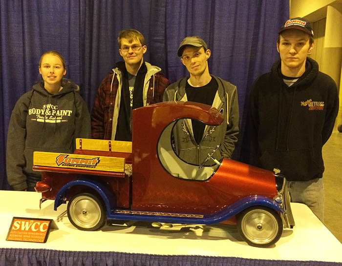 Students with pedal car