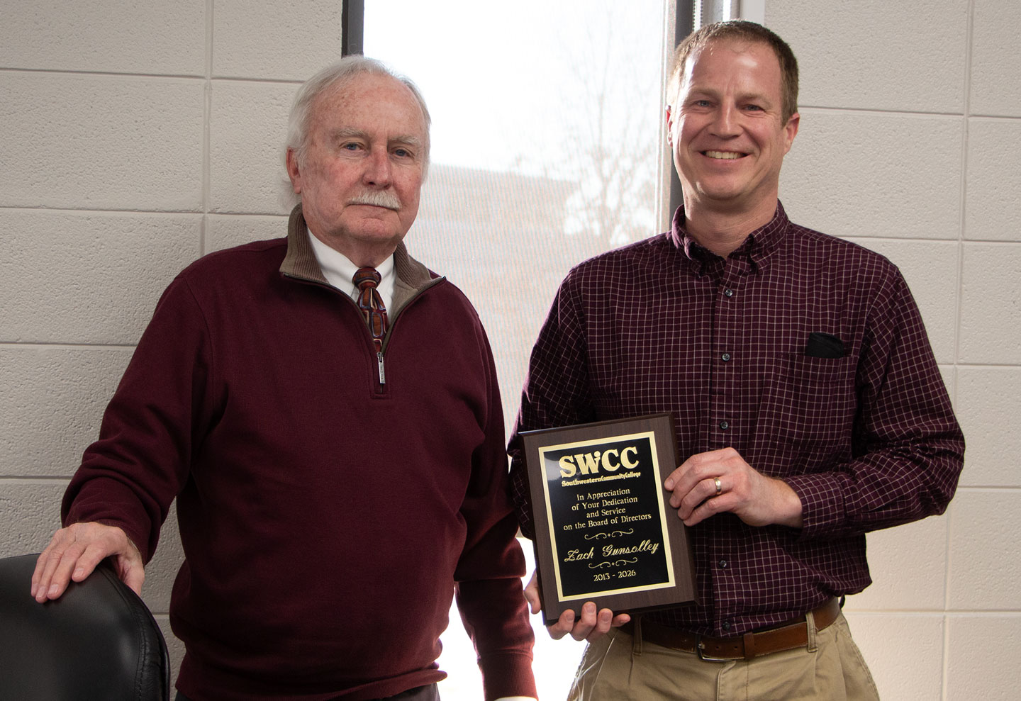 Fred Shearer of Corning, SWCC board vice president, and Zach Gunsolley of Diagonal, former SWCC board member.