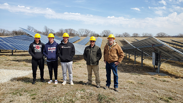 SWCC students Noah Leist, Anthony Comfort, and Alex Fascia; Clint Williams, SWCC science instructor; and Wayne Nelson, from Central Iowa Power Cooperative (CIPCO).