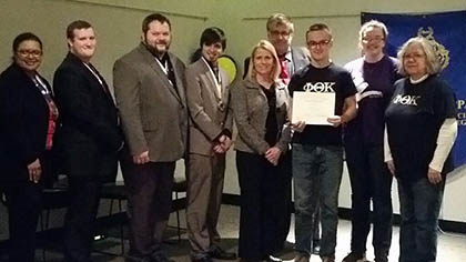 Front row (L to R) - Elizabeth Wantland, Kevin Miller, Tom Hol, and Dakota McKune, 2016-2017 Iowa Regional Officers; Monika Byrd, Phi Theta Kappa International Associate VP of Leadership & International Education; Gabe Esser; Gabrielle Annonson; and Jody Nedley-Newcomb;  Back row - Rich Underwood, Iowa Region executive board president.