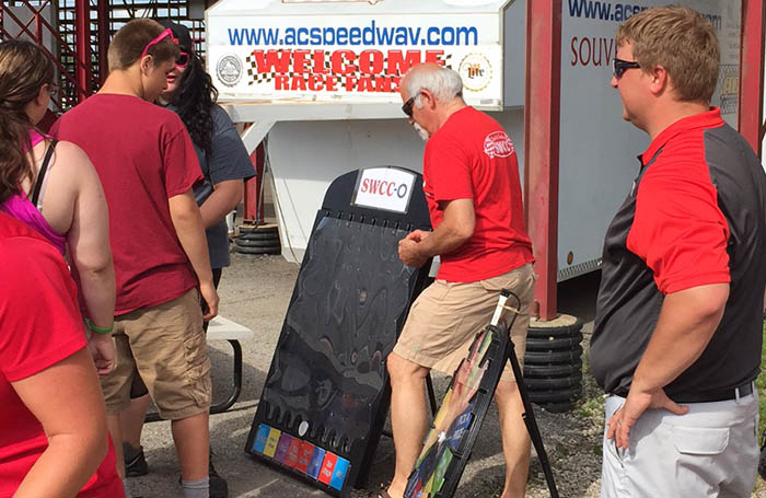 SWCC Volunteers helping kids play games