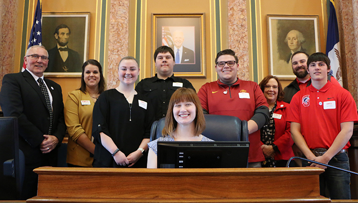 Representative Cecil Dolecheck of Mount Ayr; Cait Maitlen, SWCC Student Senate sponsor; Kylie Shackelford, SWCC student; Cody Winkler, SWCC student; Brenna Bruns (seated), SWCC student; Wiley Ray, SWCC student; Dr. Marjorie McGuire-Welch, SWCC president; Shawn Oaks, SWCC industrial technology instructor; and Lane O’Brien, SWCC student.