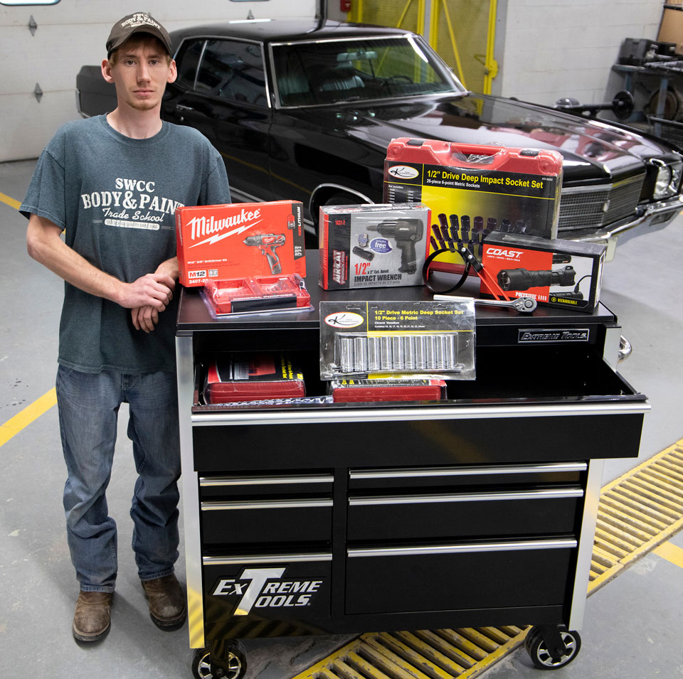 James Bourn with toolbox and tools