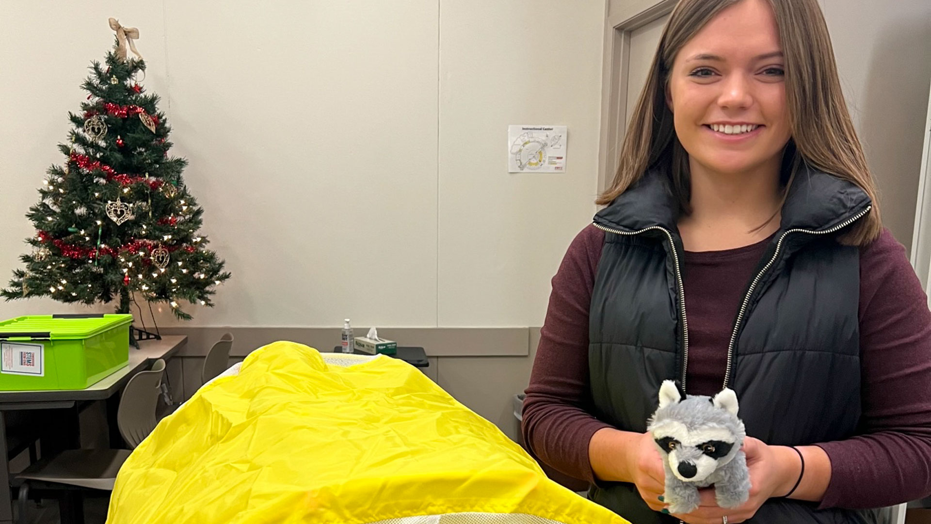 education student with stuffed animal