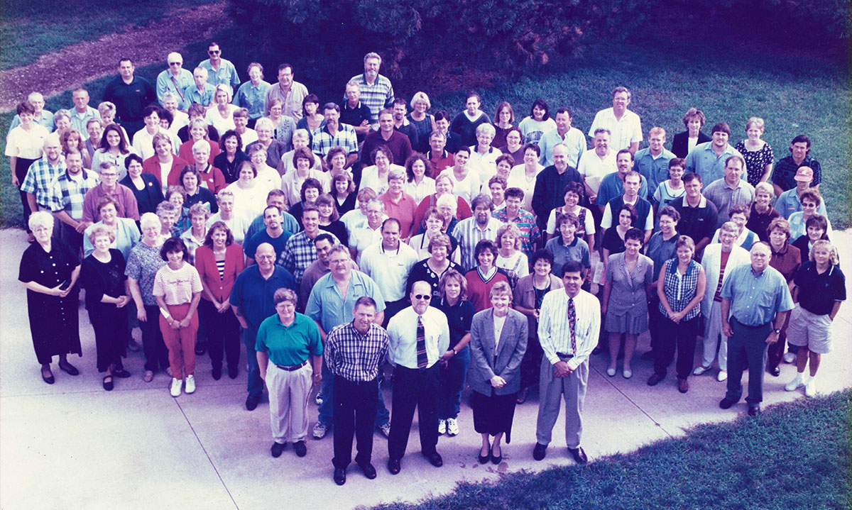 Dr. Barb Crittenden (front row, second from right) poses with Southwestern Community College faculty and staff on August 20, 1999, during All-Staff In-Service.