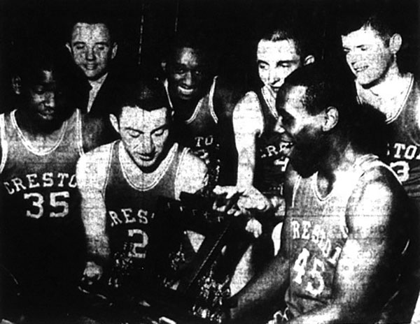 Bears team members holding the regional championship trophy after their regional tournament victory