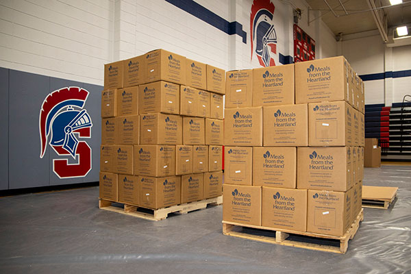pallets filled with boxes of meals